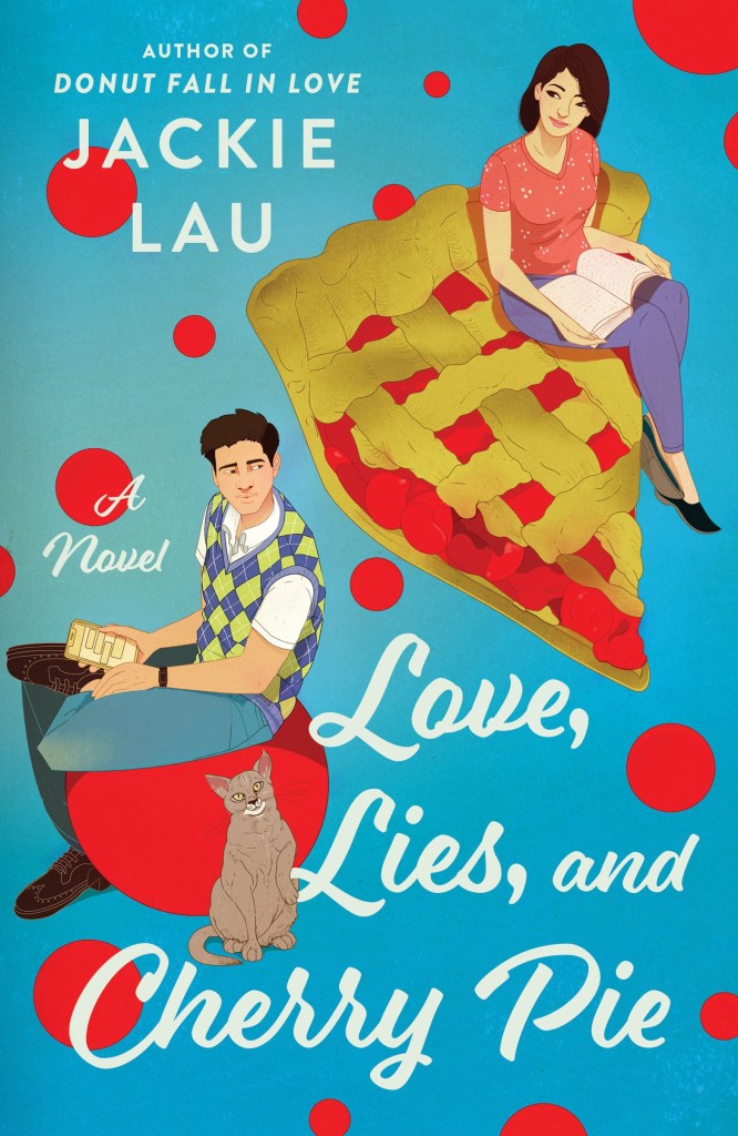 Illustrated cover of Love, Lies, and Cherry Pie by Jackie Lau. Blue background with red polka dots of different sizes. East Asian man in argyle sweater vest is sitting on the largest of these dots, and he's holding a phone. Cat is beside him. Woman is sitting on a slice of cherry pie. She has a book open on her lap and is glancing in the man's direction.